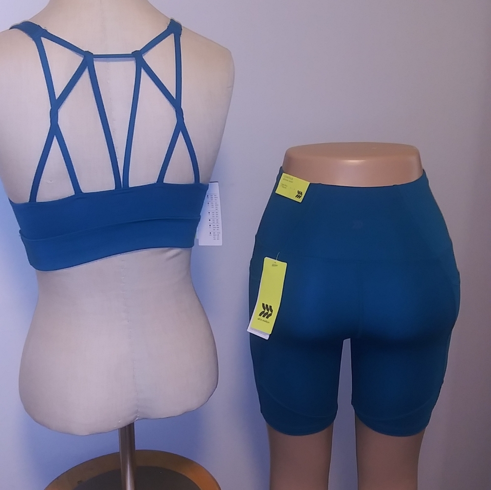 Nwt all in motion teal work out set sports bra and biker shorts XS